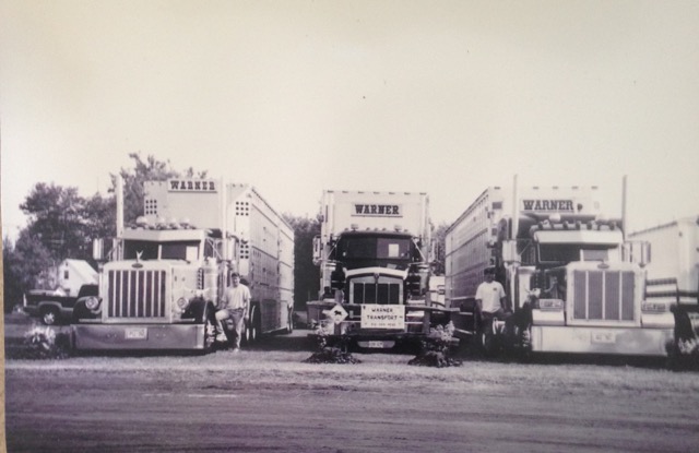 3 vintage warner trucks